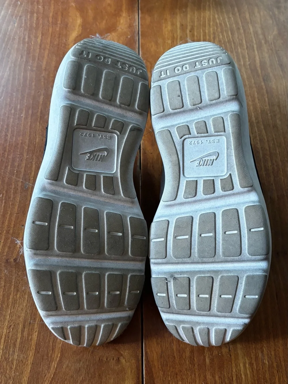 Nike Light Gray/White Slip-On Sneakers with Black Swoosh